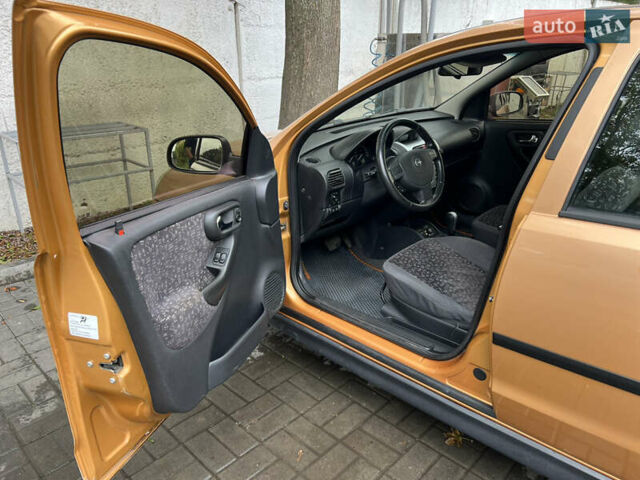 Жовтий Опель Корса, об'ємом двигуна 1.2 л та пробігом 244 тис. км за 3300 $, фото 12 на Automoto.ua