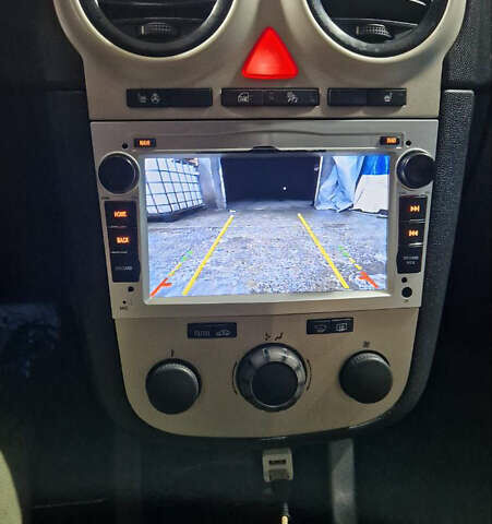 Желтый Опель Корса, объемом двигателя 1.23 л и пробегом 111 тыс. км за 5650 $, фото 14 на Automoto.ua