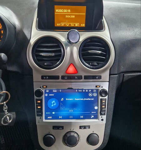 Желтый Опель Корса, объемом двигателя 1.23 л и пробегом 111 тыс. км за 5650 $, фото 16 на Automoto.ua