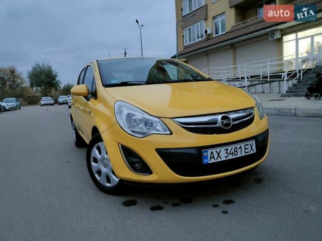Желтый Опель Корса, объемом двигателя 1.23 л и пробегом 176 тыс. км за 5500 $, фото 20 на Automoto.ua
