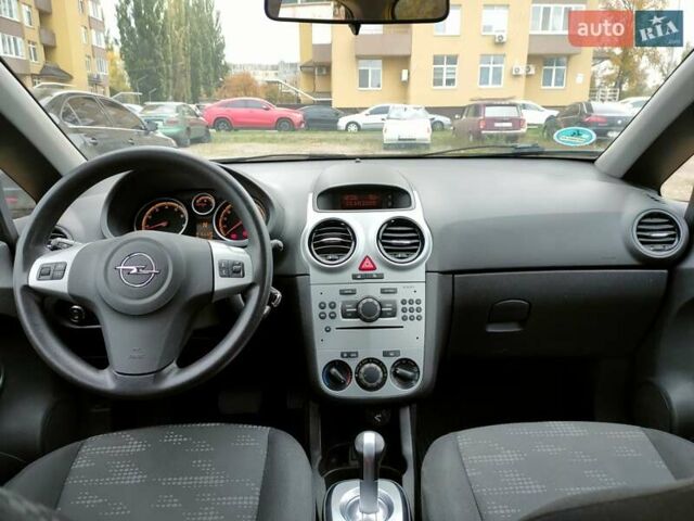 Желтый Опель Корса, объемом двигателя 1.23 л и пробегом 176 тыс. км за 5750 $, фото 5 на Automoto.ua