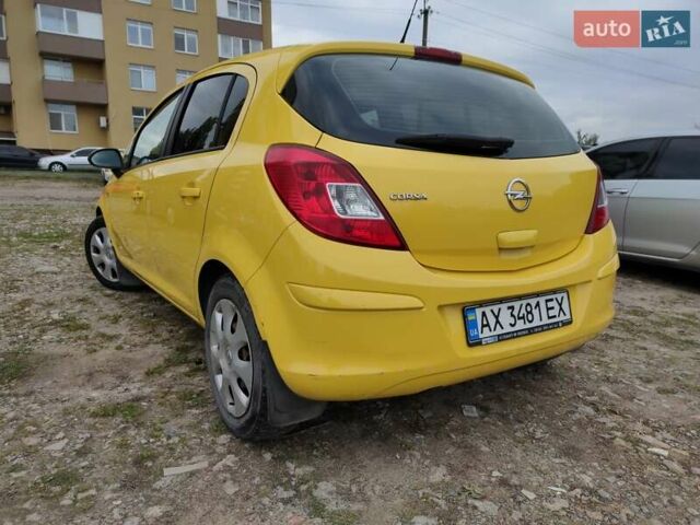 Желтый Опель Корса, объемом двигателя 1.23 л и пробегом 176 тыс. км за 5750 $, фото 27 на Automoto.ua