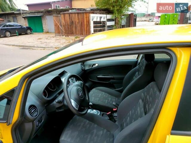 Желтый Опель Корса, объемом двигателя 1.23 л и пробегом 176 тыс. км за 5500 $, фото 21 на Automoto.ua