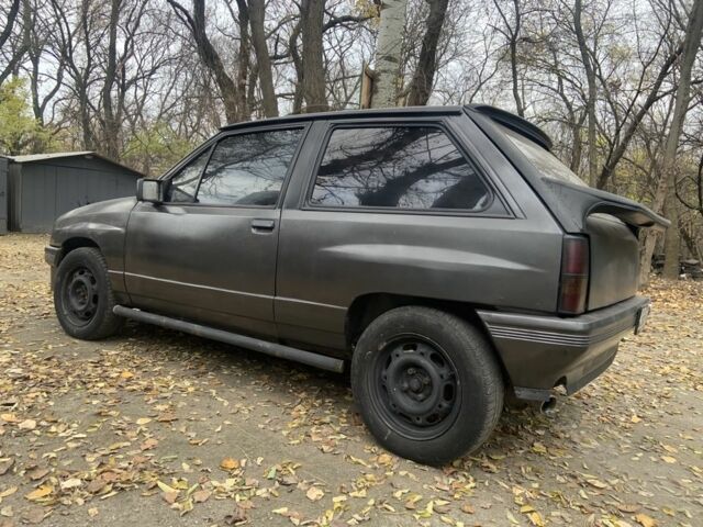 Серый Опель Корса, объемом двигателя 1.3 л и пробегом 333 тыс. км за 600 $, фото 5 на Automoto.ua