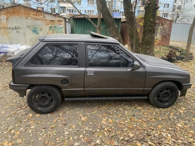 Серый Опель Корса, объемом двигателя 1.3 л и пробегом 333 тыс. км за 600 $, фото 6 на Automoto.ua