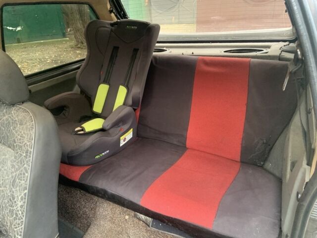 Серый Опель Корса, объемом двигателя 1.3 л и пробегом 333 тыс. км за 600 $, фото 12 на Automoto.ua