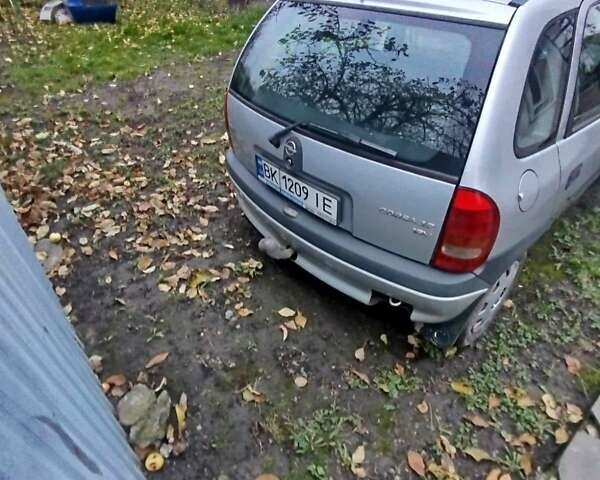 Серый Опель Корса, объемом двигателя 1.2 л и пробегом 220 тыс. км за 550 $, фото 7 на Automoto.ua