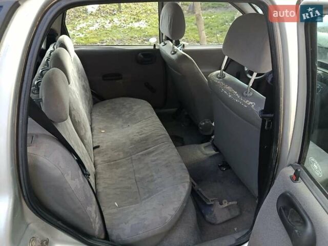 Серый Опель Корса, объемом двигателя 1.2 л и пробегом 220 тыс. км за 550 $, фото 5 на Automoto.ua