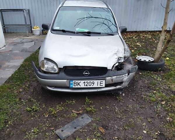 Серый Опель Корса, объемом двигателя 1.2 л и пробегом 220 тыс. км за 550 $, фото 2 на Automoto.ua