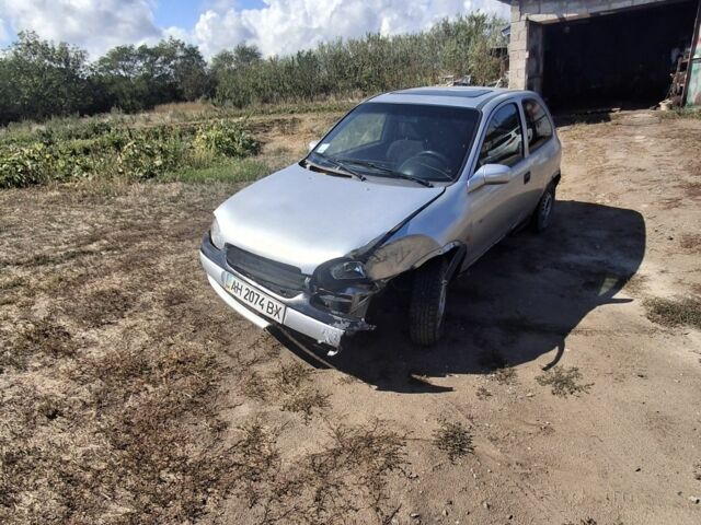 Серый Опель Корса, объемом двигателя 1 л и пробегом 200 тыс. км за 238 $, фото 4 на Automoto.ua