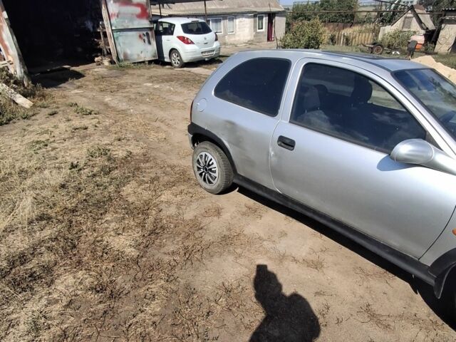 Серый Опель Корса, объемом двигателя 1 л и пробегом 200 тыс. км за 238 $, фото 2 на Automoto.ua