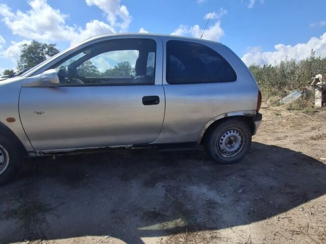 Серый Опель Корса, объемом двигателя 1 л и пробегом 200 тыс. км за 238 $, фото 3 на Automoto.ua