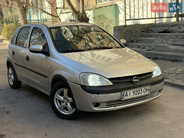 Серый Опель Корса, объемом двигателя 1.2 л и пробегом 220 тыс. км за 2350 $, фото 4 на Automoto.ua