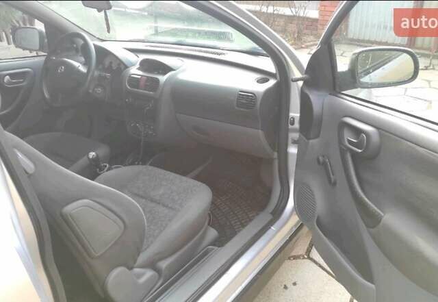 Серый Опель Корса, объемом двигателя 1.2 л и пробегом 274 тыс. км за 2895 $, фото 4 на Automoto.ua