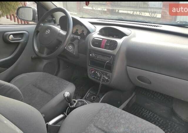 Серый Опель Корса, объемом двигателя 1.2 л и пробегом 274 тыс. км за 2895 $, фото 3 на Automoto.ua