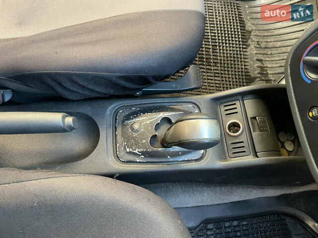 Серый Опель Корса, объемом двигателя 1.2 л и пробегом 220 тыс. км за 2350 $, фото 9 на Automoto.ua