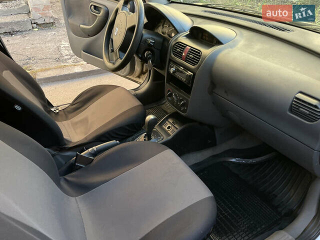 Серый Опель Корса, объемом двигателя 1.2 л и пробегом 220 тыс. км за 2350 $, фото 8 на Automoto.ua