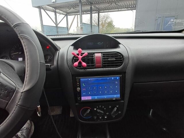 Опель Корса 2003 в Андрушевке на Automoto.ua Серый Опель Корса, объемом двигателя 1.2 л и пробегом 281 тыс. км за 2500 $, фото 2 на Automoto.ua