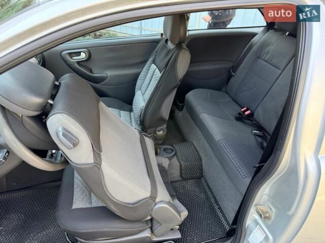 Серый Опель Корса, объемом двигателя 1.2 л и пробегом 160 тыс. км за 3500 $, фото 11 на Automoto.ua