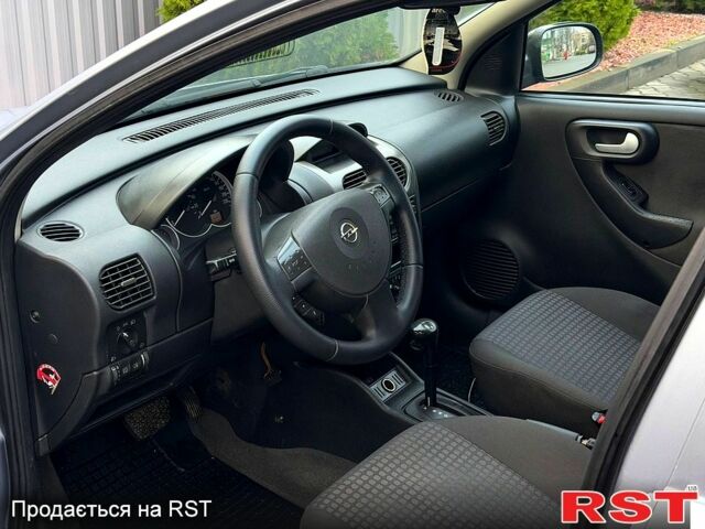 Серый Опель Корса, объемом двигателя 1.2 л и пробегом 234 тыс. км за 3000 $, фото 5 на Automoto.ua