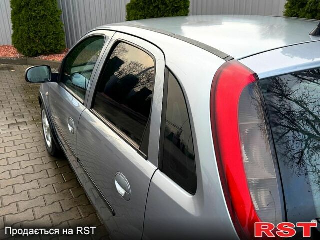 Серый Опель Корса, объемом двигателя 1.2 л и пробегом 234 тыс. км за 3000 $, фото 3 на Automoto.ua