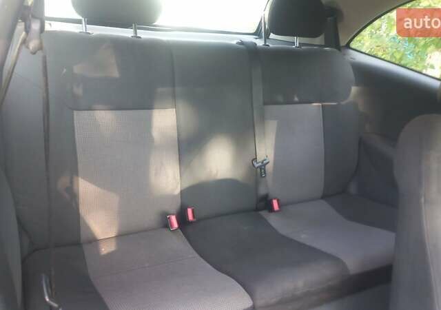 Серый Опель Корса, объемом двигателя 1 л и пробегом 200 тыс. км за 2800 $, фото 7 на Automoto.ua