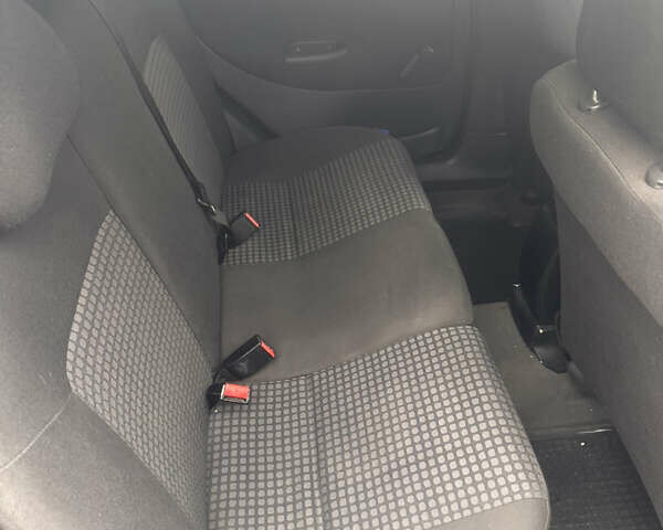 Серый Опель Корса, объемом двигателя 1 л и пробегом 238 тыс. км за 2800 $, фото 5 на Automoto.ua