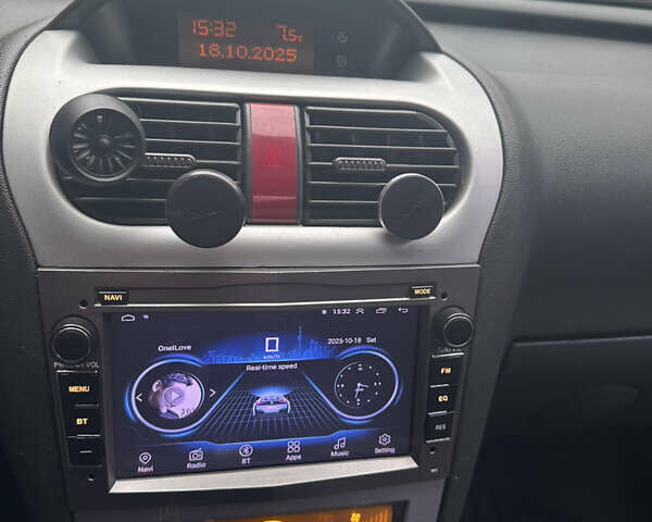 Серый Опель Корса, объемом двигателя 1 л и пробегом 237 тыс. км за 2900 $, фото 13 на Automoto.ua