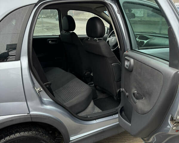 Серый Опель Корса, объемом двигателя 1 л и пробегом 137 тыс. км за 3600 $, фото 9 на Automoto.ua