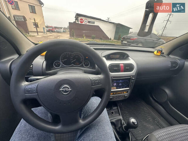 Серый Опель Корса, объемом двигателя 1 л и пробегом 238 тыс. км за 2800 $, фото 7 на Automoto.ua