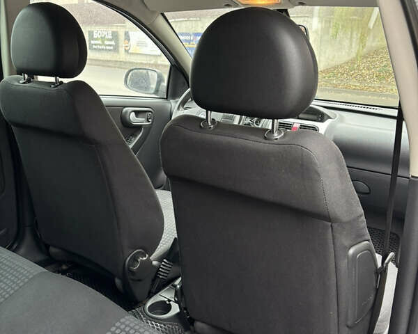 Серый Опель Корса, объемом двигателя 1 л и пробегом 137 тыс. км за 3600 $, фото 8 на Automoto.ua