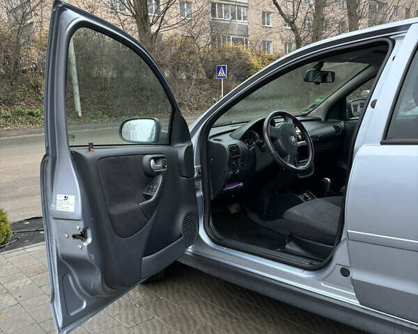 Серый Опель Корса, объемом двигателя 1 л и пробегом 137 тыс. км за 3600 $, фото 19 на Automoto.ua