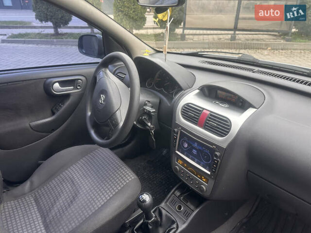 Серый Опель Корса, объемом двигателя 1 л и пробегом 238 тыс. км за 2800 $, фото 4 на Automoto.ua