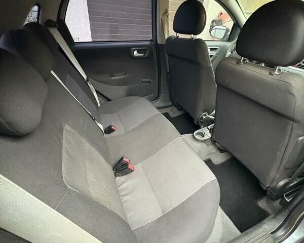 Серый Опель Корса, объемом двигателя 1 л и пробегом 216 тыс. км за 3800 $, фото 10 на Automoto.ua