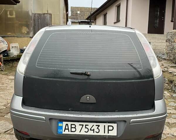 Серый Опель Корса, объемом двигателя 1 л и пробегом 216 тыс. км за 3800 $, фото 4 на Automoto.ua