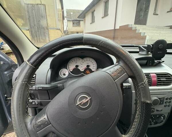 Серый Опель Корса, объемом двигателя 1 л и пробегом 216 тыс. км за 3800 $, фото 8 на Automoto.ua