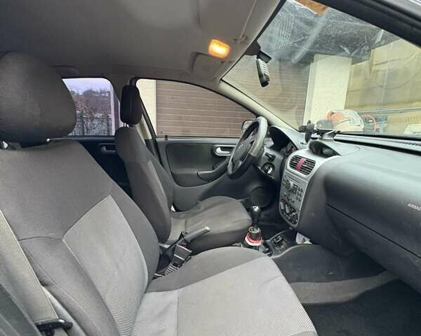 Серый Опель Корса, объемом двигателя 1 л и пробегом 216 тыс. км за 3800 $, фото 9 на Automoto.ua