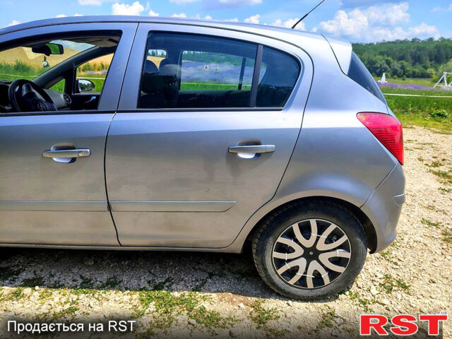 Серый Опель Корса, объемом двигателя 1.2 л и пробегом 241 тыс. км за 4300 $, фото 2 на Automoto.ua