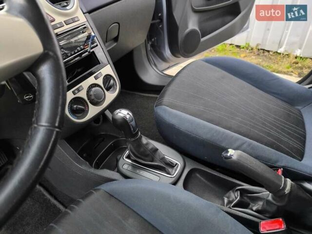 Серый Опель Корса, объемом двигателя 1.4 л и пробегом 211 тыс. км за 6750 $, фото 16 на Automoto.ua