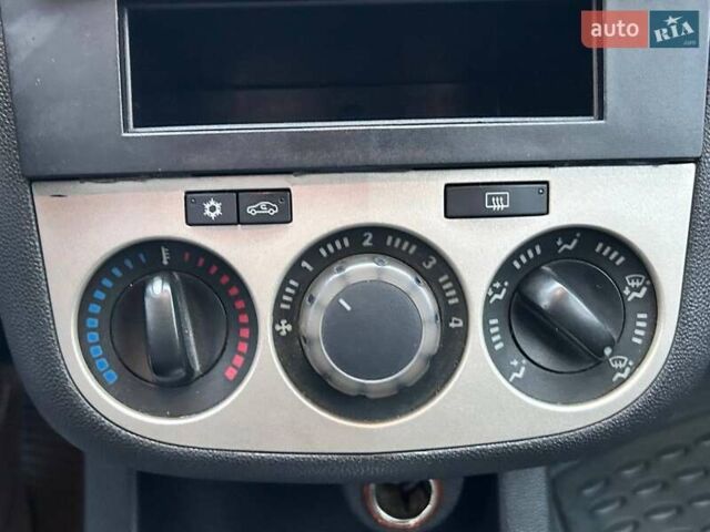 Серый Опель Корса, объемом двигателя 1.23 л и пробегом 375 тыс. км за 3200 $, фото 18 на Automoto.ua