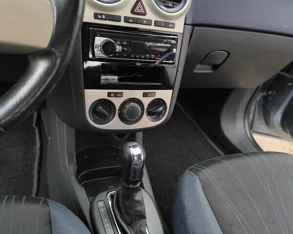 Серый Опель Корса, объемом двигателя 1.4 л и пробегом 211 тыс. км за 6750 $, фото 14 на Automoto.ua