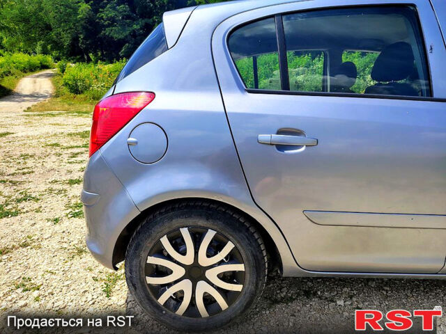 Серый Опель Корса, объемом двигателя 1.2 л и пробегом 241 тыс. км за 4300 $, фото 1 на Automoto.ua