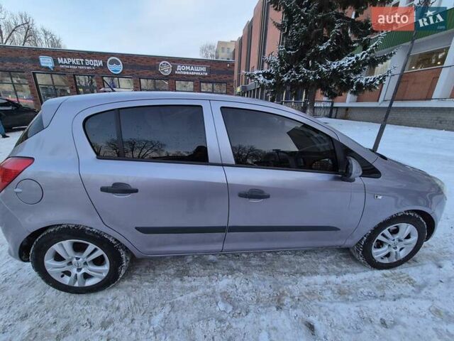 Сірий Опель Корса, об'ємом двигуна 1.23 л та пробігом 143 тис. км за 5300 $, фото 4 на Automoto.ua