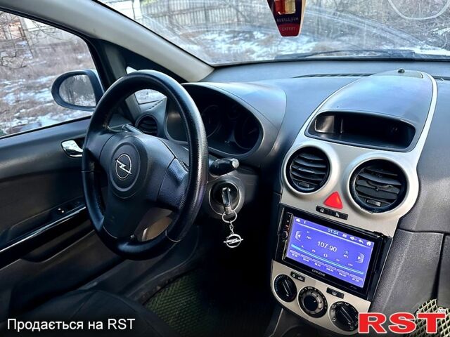 Серый Опель Корса, объемом двигателя 1.2 л и пробегом 20700 тыс. км за 4450 $, фото 10 на Automoto.ua