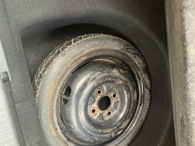 Серый Опель Корса, объемом двигателя 1 л и пробегом 130 тыс. км за 4200 $, фото 5 на Automoto.ua