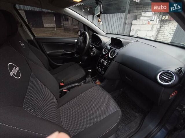 Сірий Опель Корса, об'ємом двигуна 1.2 л та пробігом 232 тис. км за 4850 $, фото 4 на Automoto.ua