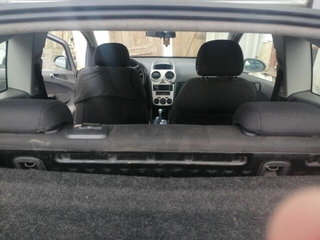 Серый Опель Корса, объемом двигателя 1.2 л и пробегом 180 тыс. км за 3432 $, фото 7 на Automoto.ua