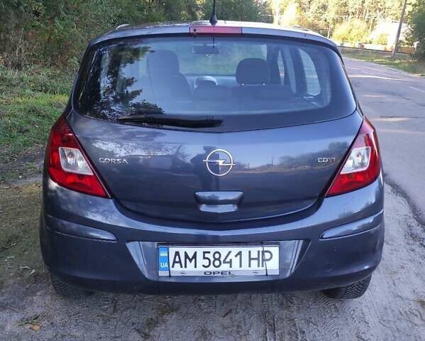 Серый Опель Корса, объемом двигателя 1.25 л и пробегом 201 тыс. км за 3900 $, фото 7 на Automoto.ua
