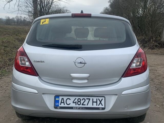 Серый Опель Корса, объемом двигателя 1 л и пробегом 130 тыс. км за 4200 $, фото 1 на Automoto.ua