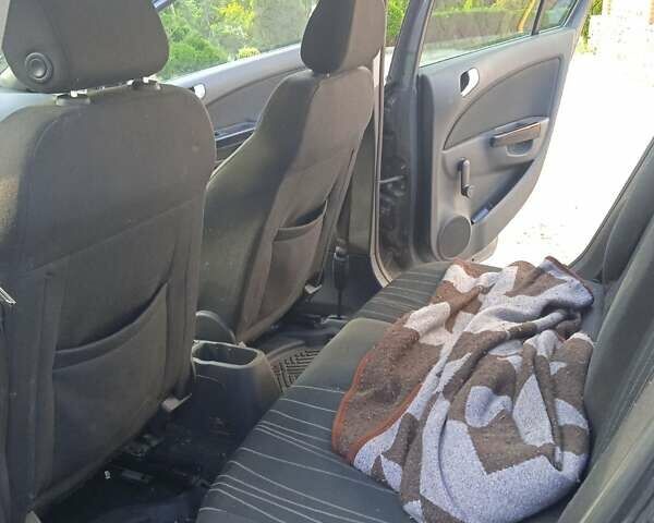 Серый Опель Корса, объемом двигателя 1.2 л и пробегом 255 тыс. км за 5400 $, фото 9 на Automoto.ua